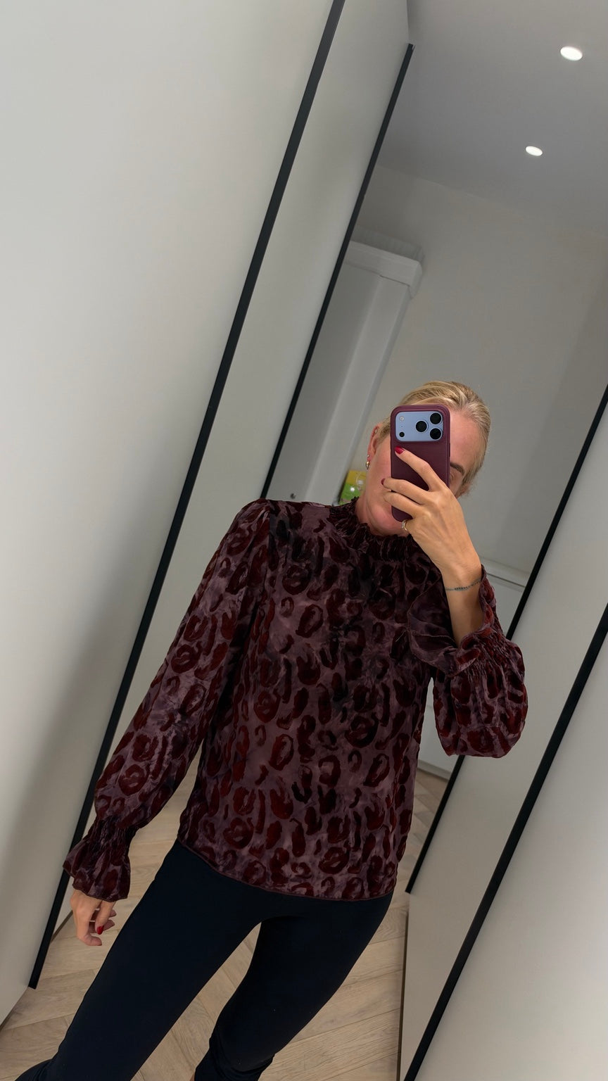Burgundy patterned blouse with shirred collar and cuffs