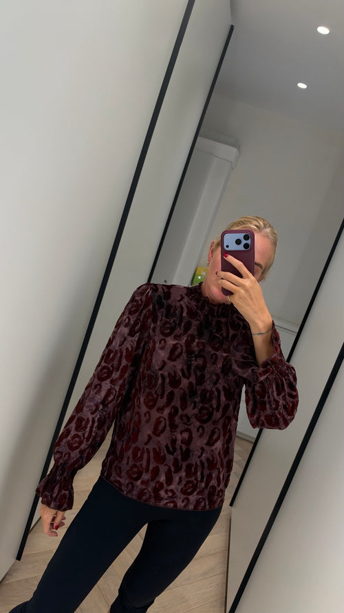 Burgundy patterned blouse with shirred collar and cuffs