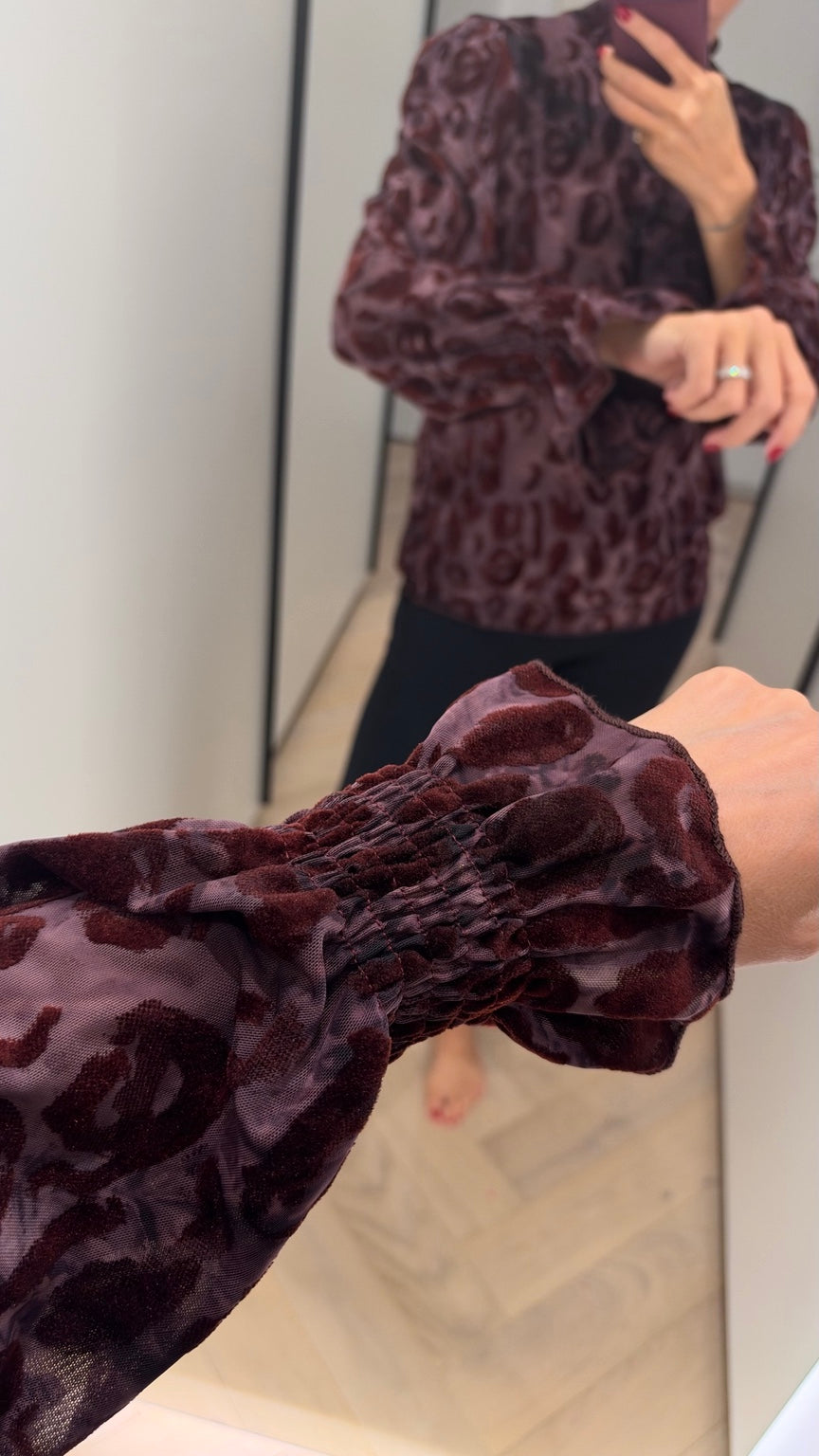 Burgundy patterned blouse with shirred collar and cuffs