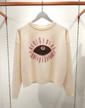 Iris cream jumper with embroidered eye