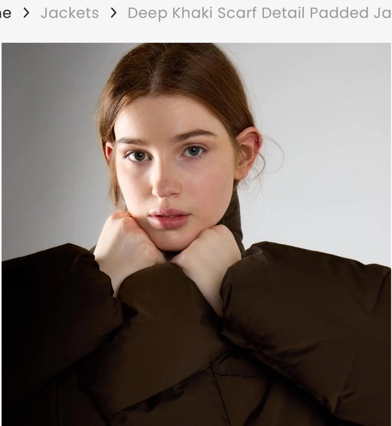 Deep khaki scarf detail padded jacket close up