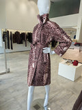 Mauve spotted belted shirt dress on mannequin